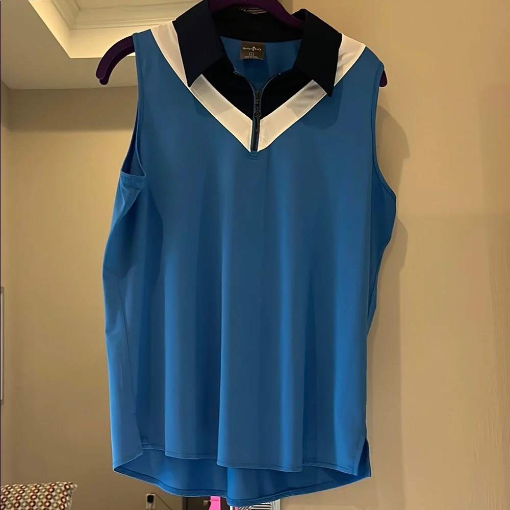 Blue Sleeveless golf Top with navy and White Accents. - Picture 1 of 5